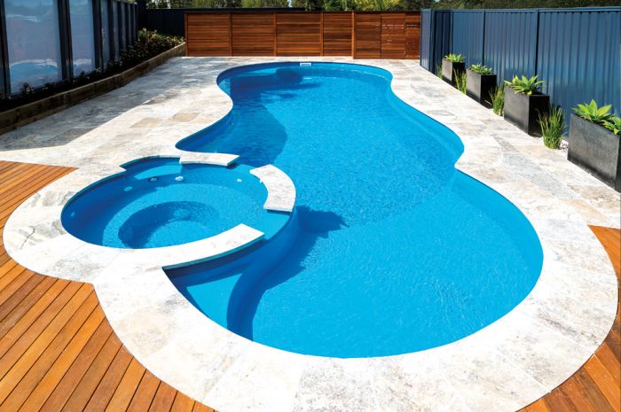 Rounded pool with decking