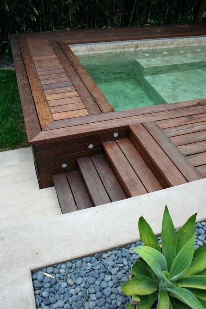 Swimming pool with wooden decking